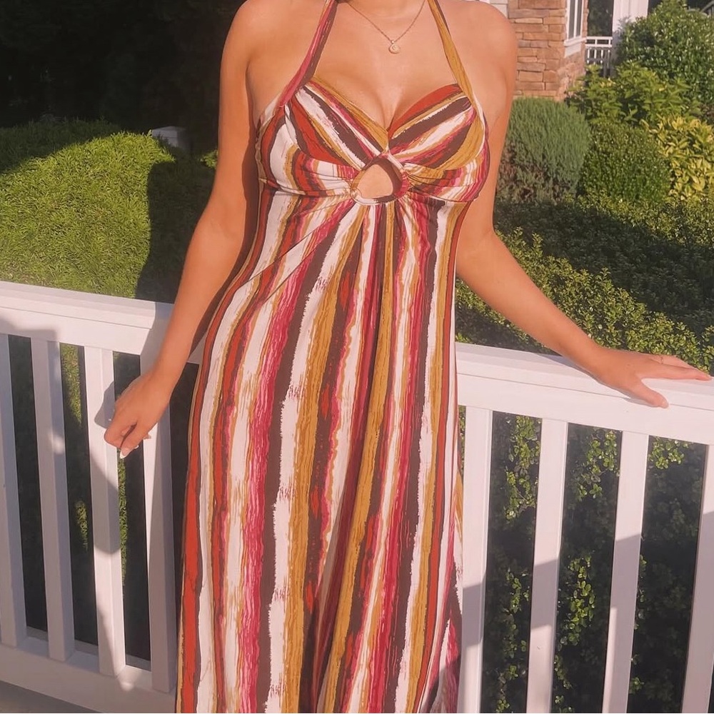 Multicolored striped halter maxi dress featuring a keyhole